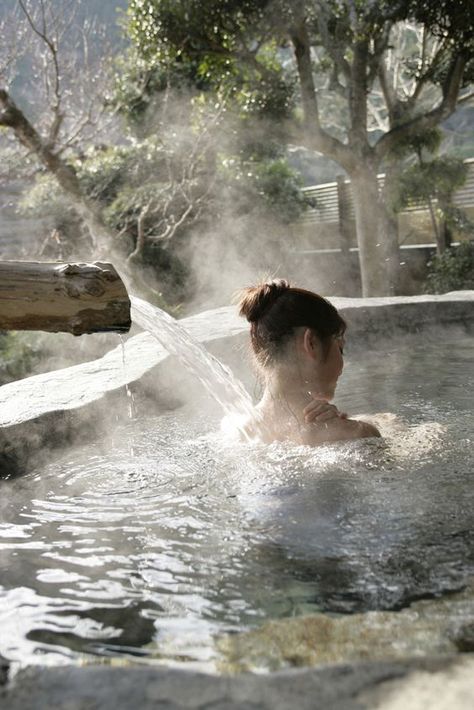 Woman soaking in hot tub, with water running down her back Casa Hobbit, Japanese Hot Springs, Japanese Bath, Infinity Pools, Girl Beach, Spa Retreat, Cool Pools, City Girl, Fantasy Landscape