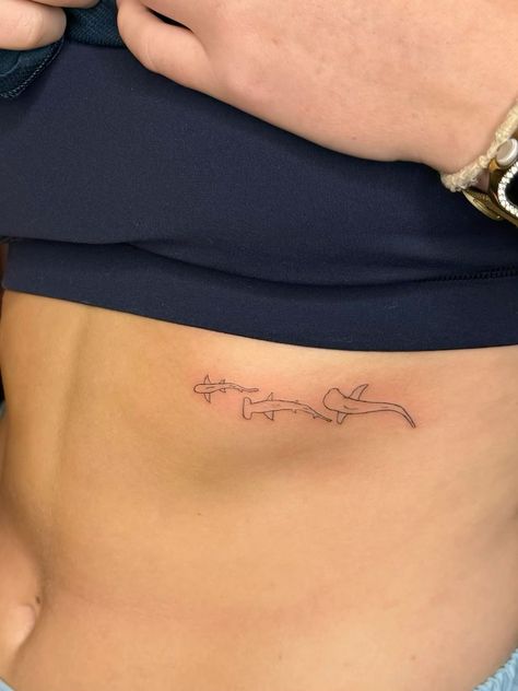 3 Sharks Tattoo, Cute Tramp Stamp Tattoos Simple, Dainty Shark Tattoo, Small Ocean Themed Tattoos, Beach Spine Tattoo, Shark Rib Tattoo, Sea Creatures Tattoo, Shark Teeth Tattoo, Hammerhead Tattoo