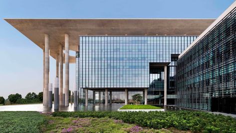 Archicentre and SHATOTTO’s Eco Edifice Marks a New Era for Corporate Architecture in Malaysia - Architizer Journal Malaysia Architecture, Company Headquarters, Concrete Column, International Style, Adaptive Reuse, Rain Water Collection, Commercial Architecture, Green Roof, Stone Flooring