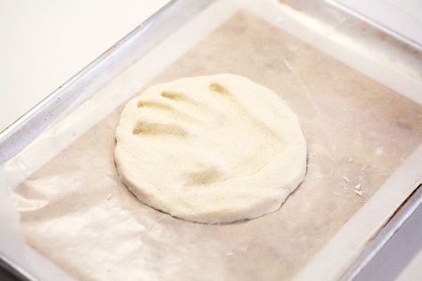 Press your child's hand into the dough. Hand Print Mold, How To Make Plaster, Clay Handprint, Plaster Hands, Homemade Clay, Baby Handprint, How To Make Clay, Mold Kit, Hand Molding