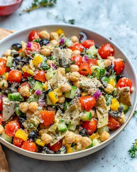 Super Flavorful Mediterranean Chickpea Salad | Healthy Fitness Meals Salad Low Calorie, Chickpea Chicken Salad, Chickpea Chicken, Volume Eating, Chickpea Salad Recipe, Mediterranean Chickpea Salad, Tomato Cucumber Salad, Fitness Meals, Chickpea Salad Recipes