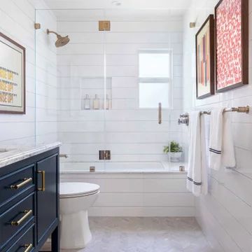 75 Beautiful Bathroom with a Shower/Bath Combination Ideas and Designs - March 2022 | Houzz UK Frameless Hinged Glass Tub Doors, Master Bath Ideas Tub Shower Combo, Small Bathroom Remodel With Tub Tile, Half Bath Into Full Bath, Bath Under Window Layout, Second Bathroom Remodel, Farmhouse Tub Shower Combo, Second Bathroom Ideas, Modern Shower Tub Combo