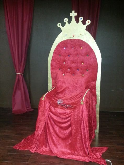 Our thrown for vbs kingdom rock: plastic lawn chair on cinder blocks, foam mattress cover, red fabric, jewels, plywood. Diy Thrown Chair, Diy Throne Chair Ideas, Vbs Kingdom Theme, Diy Throne Chair, Mighty Fortress Vbs, Castle Classroom, Royalty Theme, Kingdom Vbs, Medieval Banquet