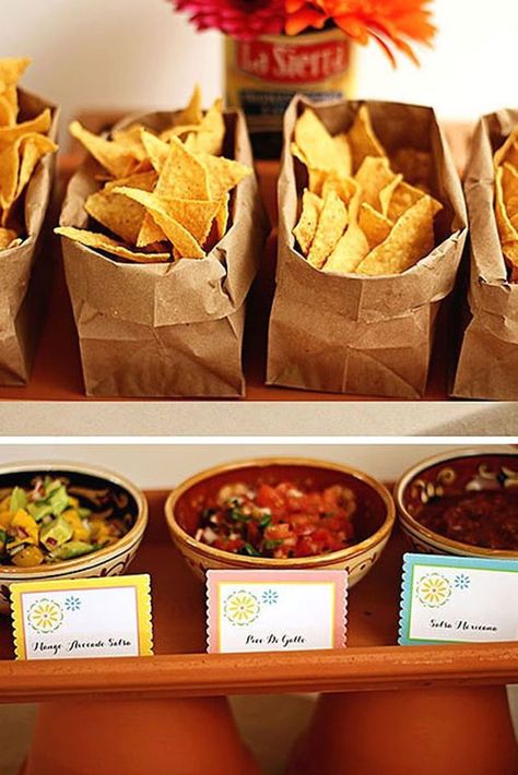 10 Delicious Ways to Serve Tacos at Your Wedding | Brit + Co Taco Bell Party Theme, Tacobar Party, Nachos Bar, Soirée Bbq, Taco Bar Wedding, Wedding Food Bars, Taco Bar Party, Salsa Bar, Wedding Food Stations