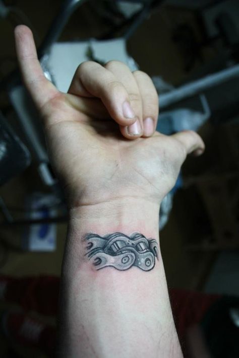 215 Coolest Bike Tattoo Ideas and Designs (2023) - TattoosBoyGirl Wrist Tattoos Girls, Gear Tattoo, Alchemy Tattoo, Bicycle Tattoo, Astronaut Tattoo, Chain Tattoo, Motorcycle Tattoos, Bike Tattoos, Biker Tattoos