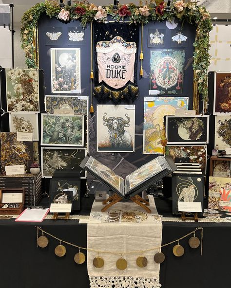 Hello Seattle and ECCC! We are set up at table M15 in artist alley 🖤 come say hello if you visit the convention. This year looks like a fantastic show. ✨ Tattoo Table Set Up, Unique Exhibition Design, Convention Stand Ideas, Convention Table Setup, Tattoo Convention Booth Ideas, Vender Display Ideas, Artist Convention Table Setup, Merch Booth Display Ideas, Art Show Set Up Booth Ideas