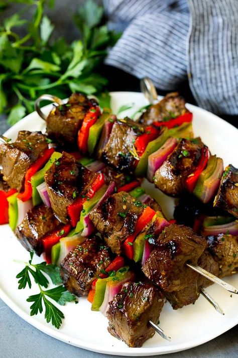 Beef Shish Kabobs Recipe | Beef Kabobs #grilling #beef #steak #dinner #dinneratthezoo #peppers Kabob Dinner, Shish Kabobs Marinade, Beef Shish Kabob, Shishkabobs Recipe, Beef Kabob Recipes, Shish Kabob, Raisin Recipes, Steak Kabobs, Lions Den