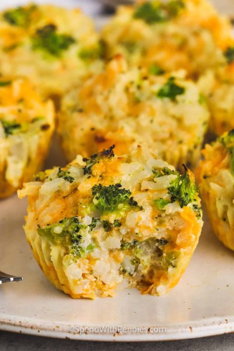 Looking for a quick and crispy snack or a breakfast or lunchtime side dish? Try this easy recipe for broccoli bites! With simple ingredients like frozen or fresh broccoli and cheddar cheese, these are ready in no time. Make homemade broccoli & cheese cups with rice, and watch them crisp up in the oven. So easy and fun to make! #cheesy #homemaderecipe #broccolibites #spendwithpennies Broccoli Cheese Cups, Cheesey Broccoli, Brocoli And Cheese, Broccoli Muffins, Broccoli Cheddar Bites, Cheesy Broccoli Bites, Broccoli Cheese Bites, Broccoli Cheese Rice, Rice Cups