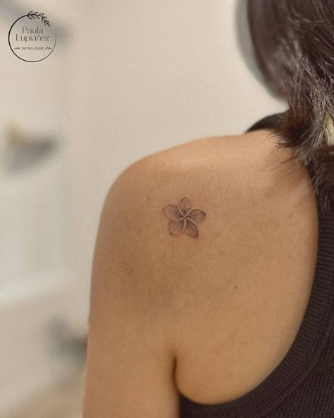 Small Flower Tattoo On Shoulder, Small Dainty Shoulder Tattoos, Kalachuchi Flower Tattoo, Plumeria Alba Tattoo, Plumeria Shoulder Tattoo, Colombian Flower Tattoo, Patch Arm Tattoos For Women, Tiny Plumeria Tattoo, Small Tropical Flower Tattoo