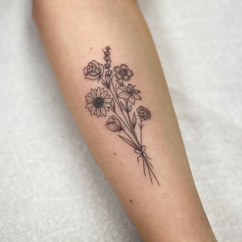 Bouquet Of 5 Flowers Tattoo, Inspirational Saying Tattoos, Sun Flower Bouquet Tattoo, Tattoo Ideas Flower Bouquet, Small Bundle Of Flowers Tattoo, Flower Bouquet Forearm Tattoo, Wildflower Forearm Tattoo Women, Flour Bouquet Tattoo, Small Floral Bouquet Tattoo