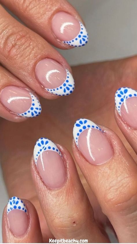 These blue and white french tip nails quite literally nail the coastal granddaughter aesthetic PERFECTLY. I am loving all of these summer nail ideas.   Photo by: @nailsbyswayz White French With Blue Dots, White And Blue Tip Nails, Coastal Granddaughter Nails Aesthetic, White French Tip With Blue Dots, French Tip Nails With Blue Design, Blue Back To School Nails, Cute White And Blue Nails, Costal Grandaughter Nails, White French Tips With Blue Design