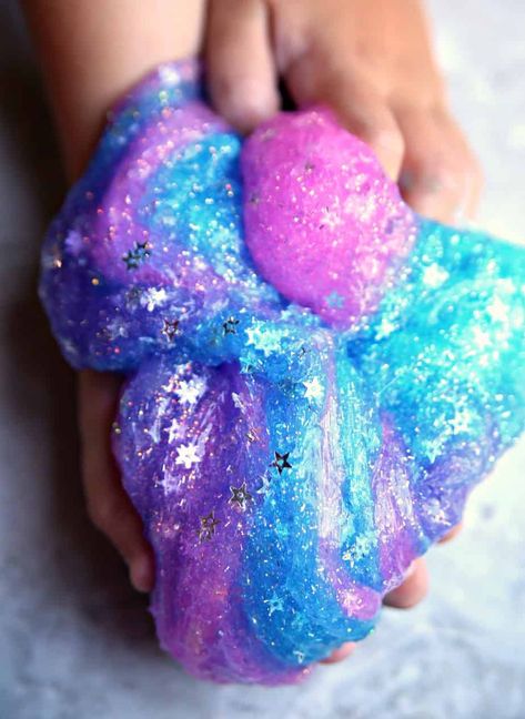 Galaxy Slime Tutorial - Fun Activity for Kids- Happy Go Lucky Galaxy Food, Diy Galaxy Slime, Best Fluffy Slime Recipe, Slime Tutorial, Glitter Projects, Fluffy Slime Recipe, Making Fluffy Slime, Pretty Slime, Galaxy Slime