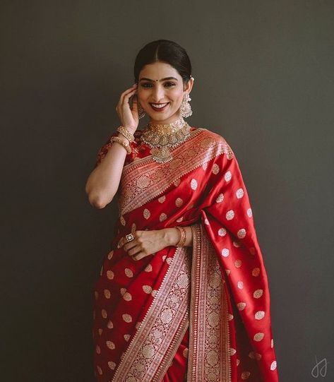 ShimmerMe | Reshma Thomas on Instagram: "Got this stunner dolled up for her engagement! Thanks @irine__thomas for choosing me to be a part of your special day! May you both be blessed with the best always💖 Saree: @sabyasachiofficial Jewellery: @jaipurgems Photography: @jacksonjamesphotography . . . #bridesofshimmerme #keralamakeupartist #bangaloremakeupartist #keralabride #southindianbride #wedmegoodsouth #wedmegoodbride #indianbride #bridesofsabyasachi #sabyasachibride #bridalsarees #bridalmak Red Shalu Saree For Bride, Red Saree Jewellery Ideas, Red Engagement Saree, Bridal Shalu Saree, Red Saree Reception Look, Benarasi Saree Wedding, Red Saree Bride, Bengali Bride Saree, Red Benarasi Saree