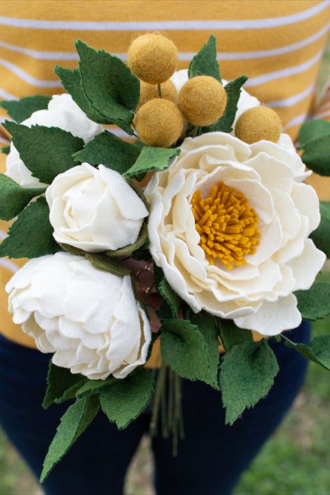 If you're looking for a DIY project that's easy to follow, then this open peony felt flower tutorial is the perfect choice for you! We'll show you how to make the flower, step-by-step, so you can get started right away! In this video, we're going to show you how to make an open peony felt flower. It's really simple to do and costs very little to make! Closed Peonies, Felt Flower Wedding, Open Peony, Peony Buds, Felt Flowers Patterns, Felt Bouquet, Felt Flower Tutorial, Felt Flower Bouquet, Mustard Flowers