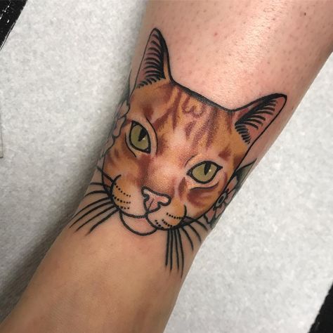 Cat portrait tattoo Cat Tattoo Orange, Orange Cat Tattoo, Chester Tattoo, Cat Portrait Tattoo, Cat Portrait Tattoos, Crochet Tattoo, Orange And White Cat, Kelly Smith, Knee Tattoo