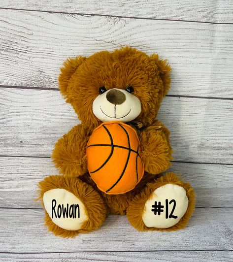 PLEASE READ FULL DESCRIPTION PLEASE READ SIZE! Personalized Basketball Bear (basketball is attached to bear} with name and year   10" Bear seated $31.75 (basketball made with felt and thread) Name and year is heat transfer vinyl What you put in the personalization section is exactly what will be on your plush animal. If you only put a name there will only be a name. if you do not include a year in the personalization section the plush will not have a year. **Letters and Numbers Only  No Symbols Birthday Gifts For Basketball Boyfriend, What To Get Your Boyfriend For Christmas Ideas, Basketball Bf Gifts, Basketball Basket For Boyfriend, Burr Basket For Boyfriend, Basketball Basket Gift Ideas, Basketball Gifts For Boyfriend, Birthday Gifts For Boyfriend Baskets, What To Get Your Boyfriend For Christmas