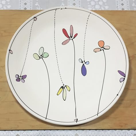 Dinner plate. Ready to be glazed. #porcelain #clay #pottery #freeceramics #flowers #color #wip Flowers Pottery Painting Ideas, Painting Pottery Plates, Ceramic Plates Art, Underglaze Painting, Ceramics Bowls Designs, Diy Pottery Painting, Paint Your Own Pottery, Pottery Painting Designs, Flowers Color