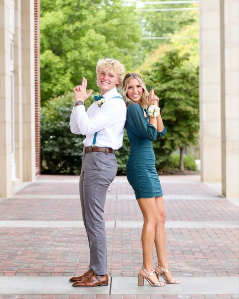 Prom Photo Ideas Couple Funny, Teal Homecoming Couple, Prom Picture Poses Funny, Green Hoco Dress Couple, Prom Pictures Couples Funny, Baseball Hoco Pictures, Couple Poses Formal Picture Ideas, Hoco Poses Couple Funny, Blue Homecoming Couple