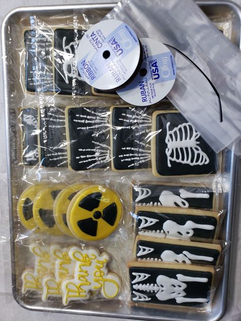 xray cookies for the end of Radiation tech week. Xray Tech Week Food, Radiography Graduation Party, Xray Cakes Radiology, X Ray Party Decorations, Mri Tech Graduation Party, X Ray Tech Week, X Ray Theme Party, Radiology Themed Party, X Ray Tech Tattoo Ideas