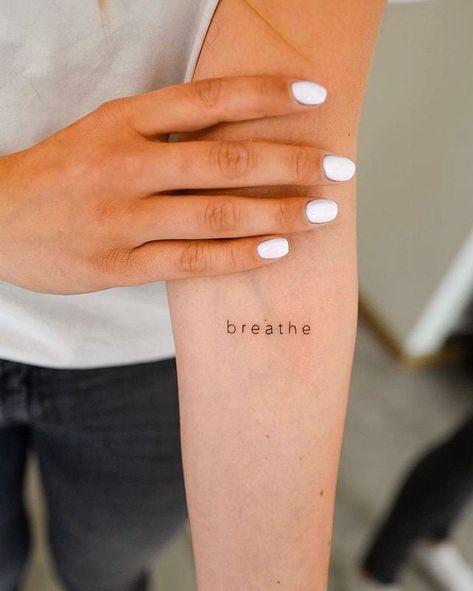 One Word Minimalist Tattoo, Breathe Arm Tattoo, Tattoos About Loving Yourself, Breathe Finger Tattoo, Breath In Breath Out Tattoo, Just One Life Tattoo, Different Not Less Tattoo, Small Tattoo Words, Love Word Tattoo