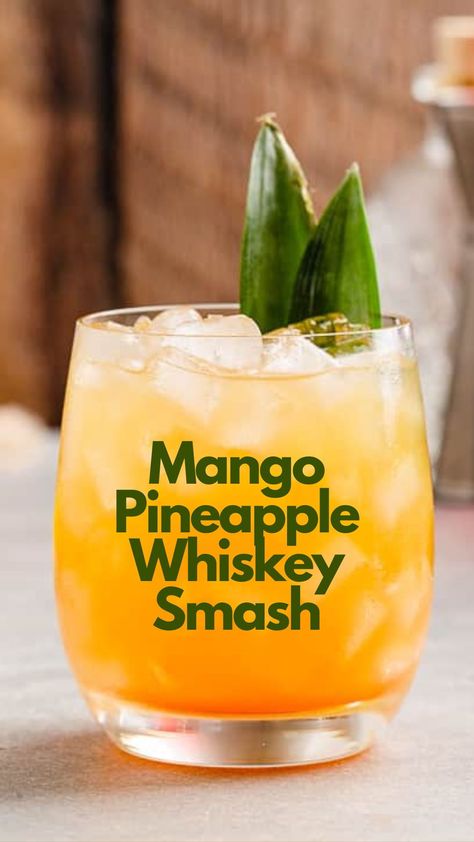 Experience the vibrant flavors of the Mango-Pineapple Whiskey Smash cocktail, where the tropical sweetness of mango puree and pure pineapple juice dance harmoniously with the zesty kick of lime juice. #MangoPineappleWhiskeySmash Mango Pineapple Cocktail, Pineapple Mango Margarita, Mango Whiskey Cocktail, Pineapple Old Fashioned Cocktail, Pineapple Whiskey Drinks, Mango Puree Cocktails, Mango Drinks Alcohol, Mango Cocktail Recipes, Mango Juice Cocktail