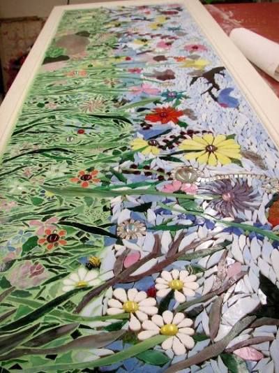 A myriad of colors show in the intricacies of the design Tile Planter, Mosaic Fireplace, Winter Projects, Mosaic Garden Art, Mosaic Art Projects, Floral Mosaic, Mosaic Stained, Mosaic Tile Art, Mosaic Murals