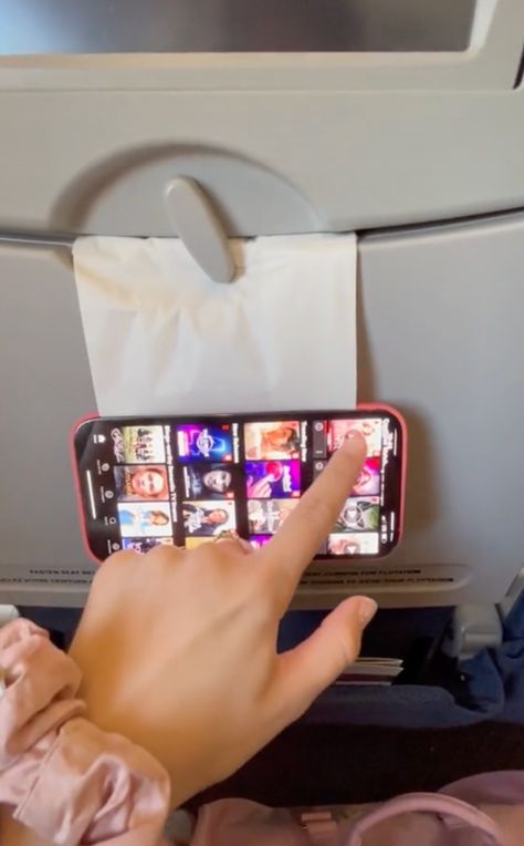 A TIKTOKER has revealed a very useful iPhone hack for anyone planning to jet off on holiday this year – and it costs you nothing. With travel finally back on, this trick is perfect for anyone who wants to enjoy Netflix or anything else on their phone but have limited luggage space for a stand. […] Cell Phone Holder Diy, Airplane Hacks, Plane Hacks, Diy Phone Stand, Iphone Hack, Travel Thoughts, Travel Hacks Airplane, Cell Phone Carrier, Cell Phone Hacks