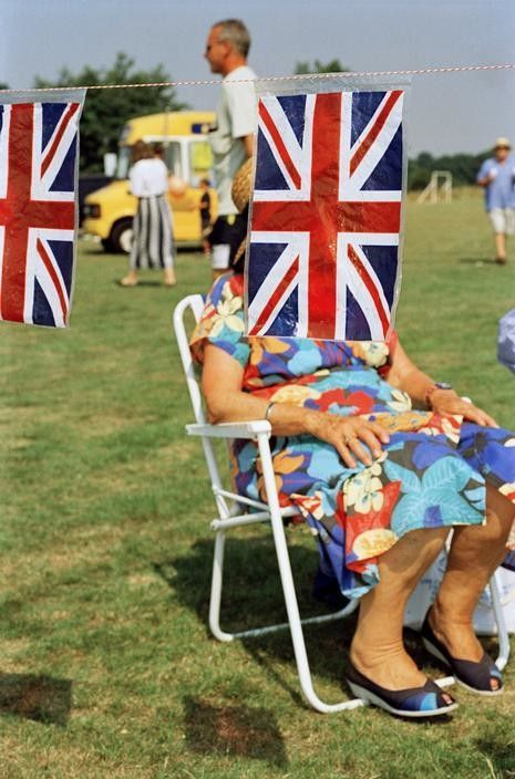 Martin Parr. British Flags at a Fair, Sedlescombe, England. 1995-99. Chromogenic color print. 40 × 60" (101.6 × 152.4 cm). Acquired through the generosity of Charles Heilbronn. 994.2014. © 2021 Martin Parr. Photography William Eggleston, Photographic Projects, Steve Mccurry, Martin Parr, Henri Cartier Bresson, Saatchi Gallery, Photographer Portfolio, Documentary Photographers, Magnum Photos