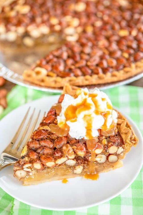 Georgia Peanut Pie - very similar to a pecan pie but with raw peanuts! SO good! This pie is SO easy to make - just whisk together eggs, vanilla, sugar, and corn syrup. Stir in the raw peanuts and pour into a frozen deep-dish pie crust. Top baked pie with some vanilla ice cream or fresh whipped cream. Can make in advance and store in an air-tight container. Peanut Pie Recipe, Whipped Cream Pie, Peanut Pie, Raw Peanuts, Plain Chicken, Desserts For A Crowd, Pie Tart, Meringue Pie, Sweet Pie