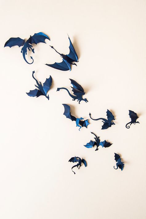 This stunning 3D wall art will keep your house feeling like home. | 22 Badass Items Every Mother Of Dragons Needs Mythical Room Decor, Fantasy Cafe, Game Of Thrones Decor, Purple Dragons, Game Of Thrones Premiere, Boys Room Blue, Dragon Wall Art, Game Of Thrones Party, Dragon Silhouette