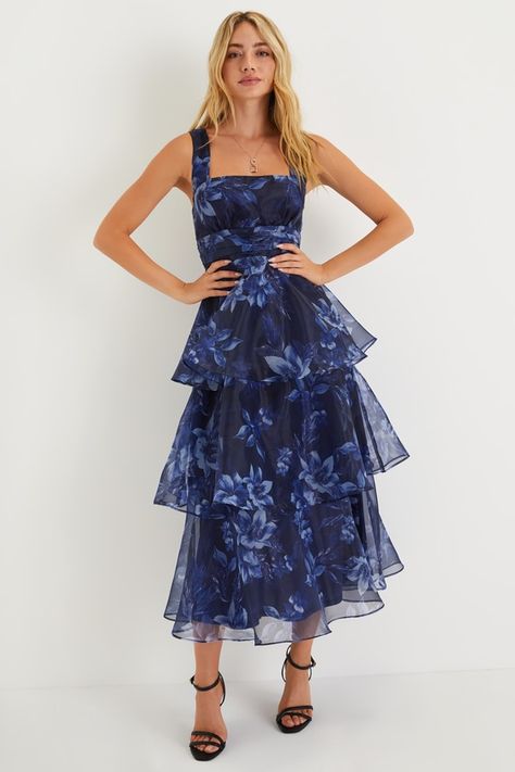 Everyone will be wowed when you walk in wearing the Lulus Dramatic Glamour Navy Blue Floral Organza Tiered Midi Dress! Airy woven organza boasts a moody floral print as it shapes wide tank straps and a square neckline. Banded waist boasts chic gathered details, atop a voluminous tiered skirt that falls to a long midi hem. Hidden zipper/clasp at side. Fit: This garment runs small - please size up. Length: Mid-calf length. Size medium measures 50.5" from shoulder to hem. Bust: Works best for A to Outdoor Wedding Guest Dresses, Floral Organza Dress, Floral Cocktail Dress, Guest Attire, Organza Dress, Rehearsal Dress, Wedding Attire Guest, Cocktail Attire, Tiered Midi Dress