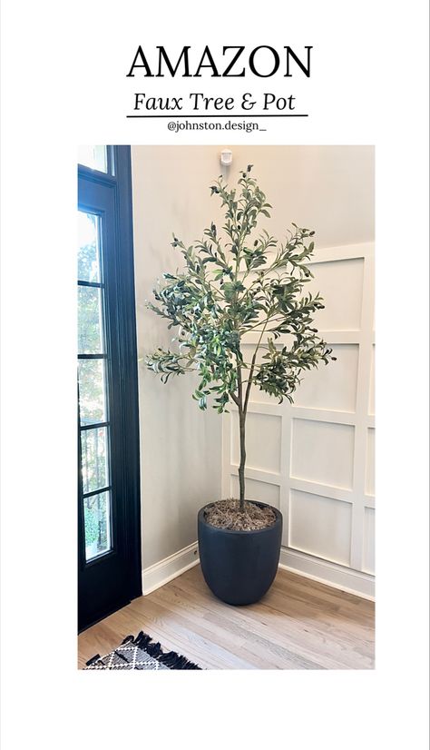 Faux olive tree and black planter in entryway Artificial Olive Tree Indoor Decor, Faux Tree In Living Room, Indoor Tree Planter Pots, Living Room Tree Plant, Decorating With Faux Trees, Olive Tree Faux, Fake Olive Trees In Pots, Olive Tree In Planter, Indoor Faux Tree