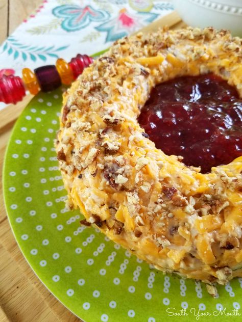 Pecan Cheddar Cheese Ring with Strawberry Preserves | Rosalynn Carter’s vintage appetizer recipe for a pecan and cheddar cheese ring with a slight hint of heat with strawberry preserves in the center served with crackers. Cheese Ring With Strawberry Preserves, Cheese Ring, Cheddar Cheese Ball, South Your Mouth, Strawberry Preserves, Appetizers Easy Finger Food, Finger Foods Easy, Cheese Ball Recipes, Cheese Spread