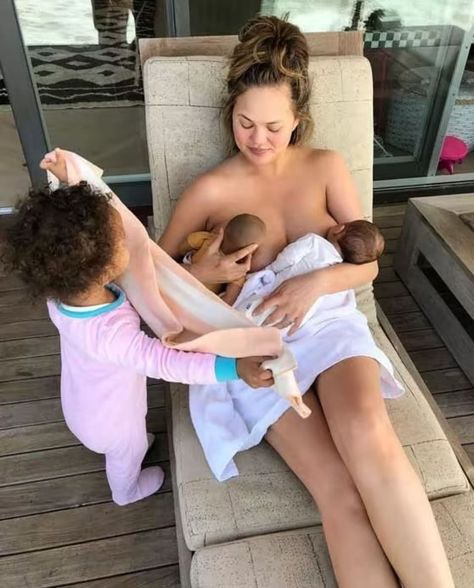 Celebrity mums breastfeeding in public: Emily Andre, Rebekah Vardy, more | HELLO! Chrissy Teigen John Legend, World Breastfeeding Week, Breastfeeding Week, Stopping Breastfeeding, Newborn Family, How To Have Twins, Celebrity Moms, Chrissy Teigen, Smile Girl