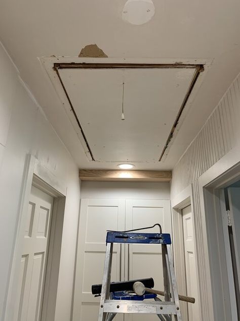 Upgrade your attic door with a hook and pull system Secret Attic Entrance, Attic Door Trim, Pull Down Attic Door Decorative, Attic Door Cover Ideas, Ceiling Attic Door Ideas, Hidden Attic Door, Attic Door Ideas Pull Down, Attic Access Door In Ceiling, Attic Door Ideas