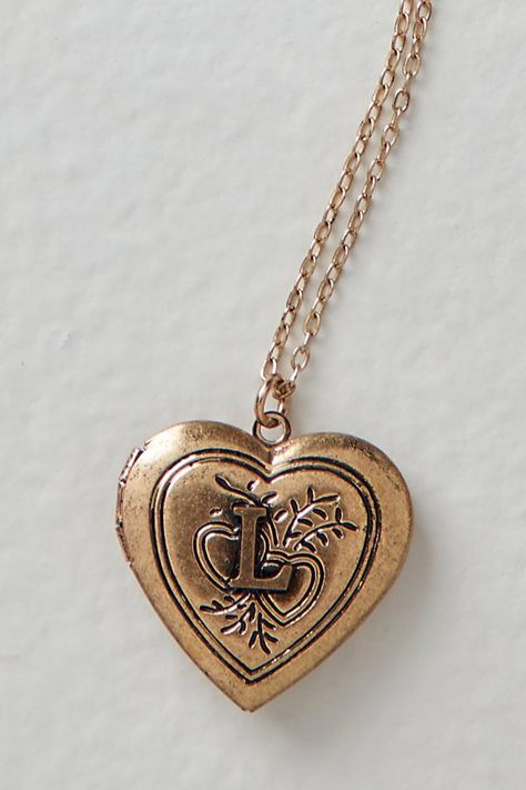 A super sweet gift or an accessory unique to you, this darling monogram necklace features a heart locket pendant with an initial engraving. **Features:** Dainty chain, heart locket pendant, hinge opening mechanism, monogram initial engraving, clasp closure **Why We | Monogram Necklace by Free People in Gold Pendant Name Necklace, Initial A Necklace, Jewelry With Initials, Initial Jewelry Silver, Gold Locket Aesthetic, Locket Outfit, Christmas Gifts Jewelry, Gifts To Get Your Bf For Christmas, I Necklace