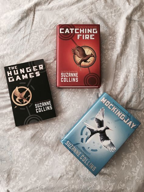 The Hunger Games Book Cover Aesthetic, Hunger Games Book Collection, Hunger Games Trilogy Books, Books Hunger Games, The Hunger Games Book Series, Hunger Games Book Aesthetic, Hunger Games Books Aesthetic, Hunger Games Book Cover, Hunger Games Book