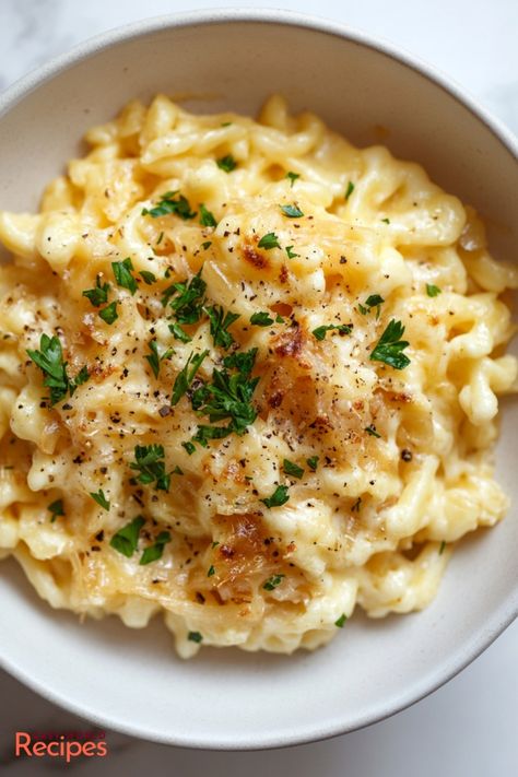 This authentic Käsespätzle (German macaroni and cheese) recipe brings you the perfect comfort food made with homemade spaetzle, Emmentaler cheese, and caramelized onions. A delicious twist on traditional macaroni and cheese. German Side Dishes, German Dinner, Italian Main Dishes, German Food Authentic, Germany Food, Homemade Egg Noodles, Macaroni And Cheese Recipe, Macaroni N Cheese Recipe, Homemade Noodles