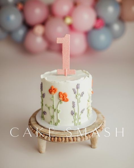 1st Birthday Cheesecake, Smash Cake Floral, 1st Birthday Tea Party Cake, Floral One Year Old Birthday Cake, Lily Themed Party First Birthdays, Wildflower 1st Birthday Cake Smash, First Birthday Cake Floral, Whimsical Smash Cake, 1st Birthday Flower Cake