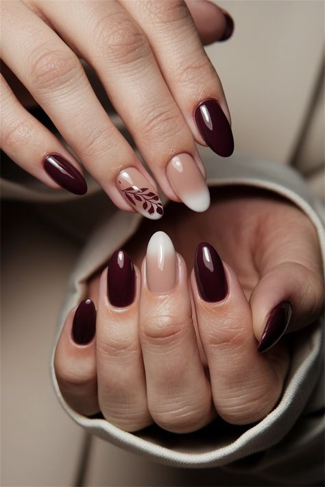 Embrace the beauty of autumn with these chic fall nail ideas that celebrate your natural nails. Picture warm earthy tones—rustic oranges, deep browns, and spicy reds—enhanced with delicate leaf designs or subtle gold accents. This style exudes seasonal elegance while keeping your nails looking effortlessly classy. Perfect for cozy gatherings or everyday wear, these natural nail designs will inspire you to showcase your best self this fall! Wine Nail Color Design, Classy Red Nail Designs, Tortoise And Burgundy Nails, Fall Nail Designs Almond Shape Short, Nails Acrylic For Dark Skin, Nails To Go With Maroon Dress, Maroon Thanksgiving Nails, Brown And Maroon Nails, Wine Red Nail Designs