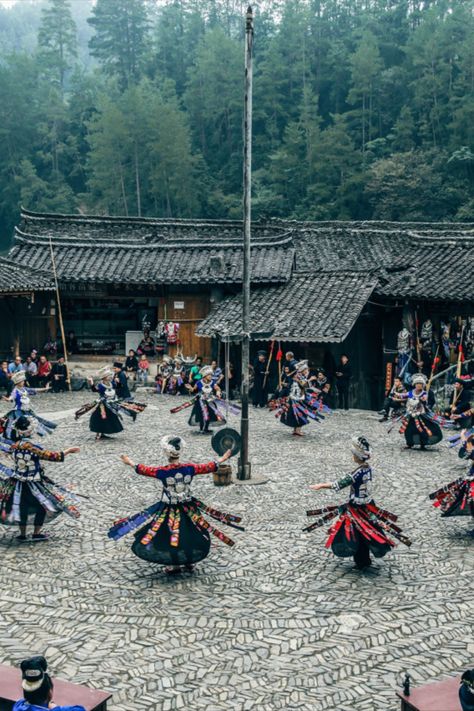 Explore the enchanting Langde Miao Village in Guizhou, China, where tradition thrives through stilted houses, exquisite silver jewelry, and vibrant dances. Witness the living Miao culture with daily performances in the village square. Bff Stickers, Stilted House, Guizhou China, Village Square, The Village, Silver Jewelry, China, Square, Silver