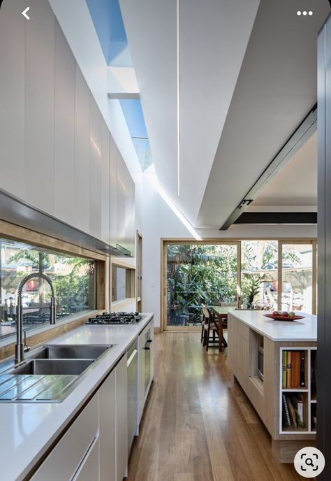 Skylight House Design, Kitchen Design With Skylight, Sky Light In Kitchen, Modern Spacious Kitchen, Skylight Interior Design, Sky Light Kitchen, Skylight Dining Room, Modern Skylight Design, Skylight Design Ideas