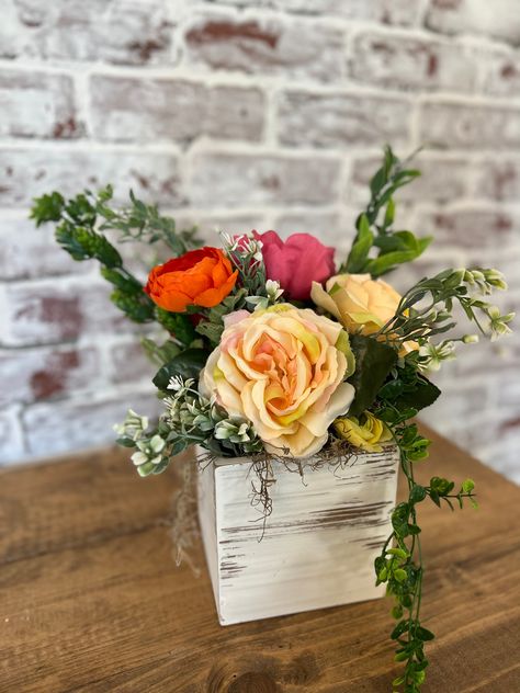 "Pink and Greenery Flower floral arrangement in white distress wood planter box..  This beautiful arrangement is perfect for any table centerpiece, bridal shower, wedding or entryway table display !!     Box Dimension approximately 5.5\"x5.5x5.5 With florals 13\" H x 10\"W  Handmade:: Please remember these arrangements are handmade items, each arrangement is unique and may slightly vary" Pink Flower Arrangement, Planter Box Centerpiece, Square Planter Boxes, Planter Centerpiece, Wood Box Centerpiece, Pink Flower Arrangements, Centerpiece Flower, Box Table, Spring Floral Arrangements