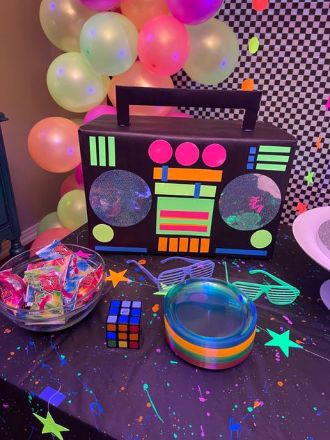 Easy DIY w/ rectangle box, neon card stock and black butcher paper. Diy 80s Centerpieces, Diy Boom Box Cardboard, Diy 80s Decorations, 80s Party Decorations Diy, Start The Party Vbs 2024, Diy 80s Party Decorations, Neon 80s Party, 90s Party Ideas, Kids Church Decor