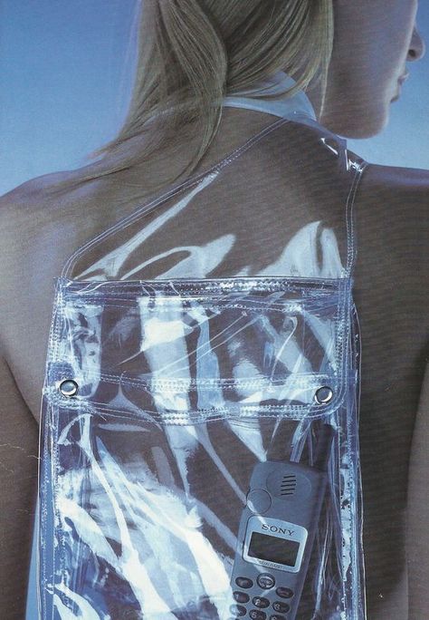 Clear vinyl one-shoulder backpack lets you carry your belongings in style.. DIY the look yourself: http://mjtrends.com/pins.php?name=clear-vinyl-for-backpack_3 Space Grunge, Futuristic Fashion, Ex Machina, Retro Futurism, Clear Vinyl, Fashion Details, Editorial Fashion, Style Guides, Fashion Photography