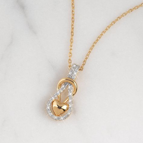 The infinity knot with a glistening puffed heart, reflects endless love in a modern way. Genuine white diamonds embellish the infinity knot and add beauty to the stunning pendant in 18kt gold-plated sterling silver. A sumptuous presentation pouch — perfect for gift-giving and safekeeping — is included at no additional charge. Real Diamond Necklace, Diamond Pendent, Infinity Knot, Infinity Heart, Gold Ring Designs, Puffed Heart, Danbury Mint, Diamond Chain, Endless Love