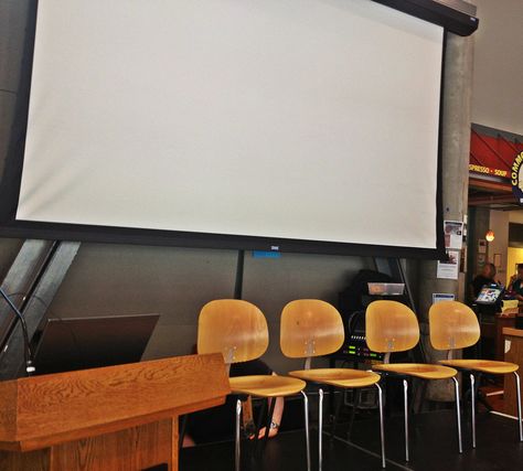 UW2 Commons - set up with stage and podium for a panel discussion. Rolling Screen and Data Projector are installed in the Commons and available for use. Data Projector, Panel Discussion, Projector, Special Event, Conference Room Table, Screen, Furniture, Home Decor, Design