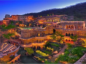 Neemrana Fort Palace Hotel, Rajasthan, India. Can't wait to return. I got engaged here, in the hanging gardens, at night time with all the fairy lights. Magic! Neemrana Fort Palace, Neemrana Fort, India Architecture, Famous Monuments, Heritage Hotel, Exotic Places, Palace Hotel, Tourist Places, Top Hotels