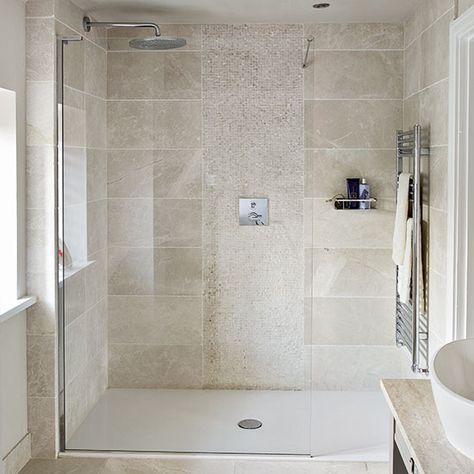 After traditional bathroom decorating ideas? Take a look at this neutral bathroom with beautiful tiles from Ideal Home for inspiration. Find more bathroom decorating and shopping ideas at housetohome.co.uk Natural Stone Tile Bathroom, Stone Tile Bathroom, Makeover Kamar Mandi, Traditional Bathroom Decor, Neutral Stone, Beautiful Tiles, Neutral Shower, Neutral Bathroom, Casa Country