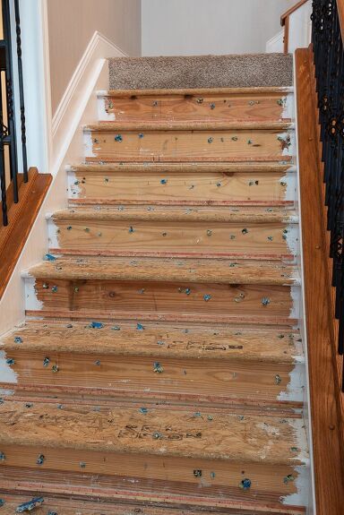 Refinish Carpeted Stairs, Carpet To Wood Stairs Diy, Flooring On Stairs Ideas, Diy Painted Stairs Makeover, Painted Basement Stairs Ideas, Diy Laminate Stairs, Carpet Staircase Makeover, Beautiful Stairs Design, Particle Board Stairs Makeover